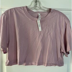 Trio of LULULEMON cropped tees size 6 in MAGENTA, LILAC & PINK